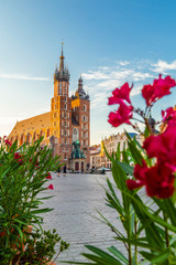 St. Mary's Basilica in Krakow, Poland, famous brick church with two towers, located on the market square in the historic centre at sunrise.