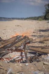 A bonfire burns in a camping i