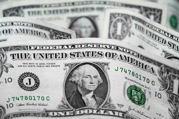 United States Dollars Closeup Concept. American Dollars Cash Money. One Dollar Banknotes. Background of 1 dollar bills in vertical position. Selective focus.