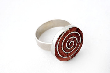 Modern jewelry incorporating Inca designs