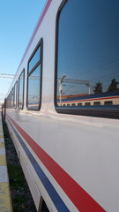 Naklejka premium Train waiting passengers at railway station.