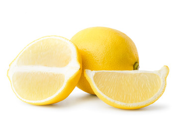 Ripe lemon, half and slice close-up on a white.