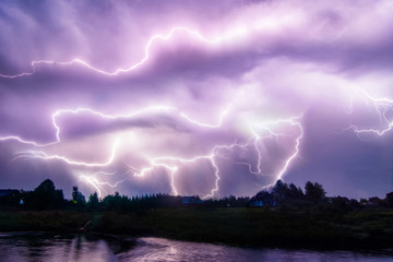 Composition photo of different lightning bolts. Thunderstorm with dramatic clouds. Lots of...