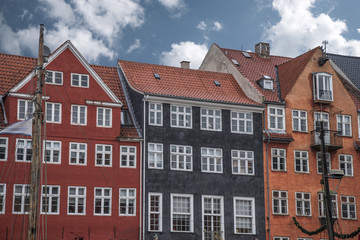 Fototapeta na wymiar Nyhavn is the old harbor of Copenhagen