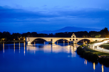 Fototapeta na wymiar Night view of the illuminated famous bridge of Avignon in Provence South France