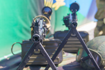 Machine guns for the military exhibition. The muzzle of a machine-gun.