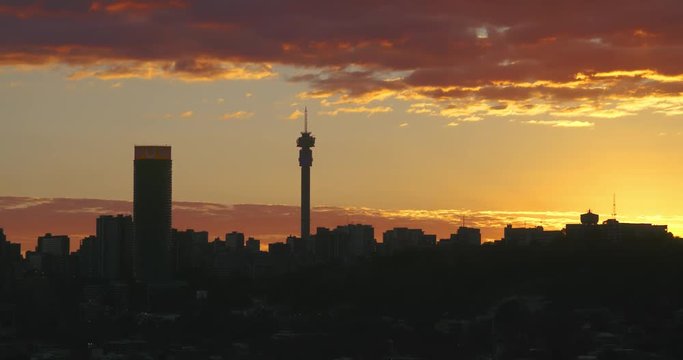 Magnificent Johannesburg / Joburg Sunset With Golden Clouds And Vista Of The City.