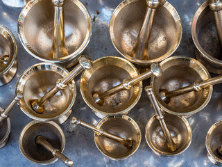 group of Brass Mortar and Pestle Top view, selective focus
