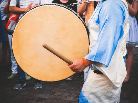 Drummer performance, Taiko Drum, Japanese folklore. Japanese artist perform at Bon Festival in blue kimono with big drum