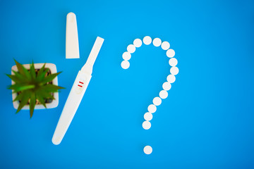 Pregnancy test. The result is positive with two strips. Treatment of infertility with pills, help...