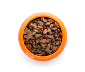 Bowl with food for cat or dog on white background. Pet care