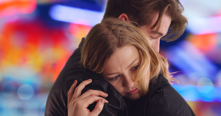 Obraz na płótnie Canvas Close up of Caucasian man hugging his beautiful girlfriend