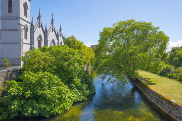 Fototapeta na wymiar River through the city of Galway in Ireland in summer