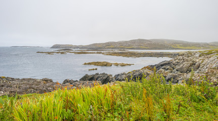 Panorama of the coast of an irish island in the atlantic ocean in summer