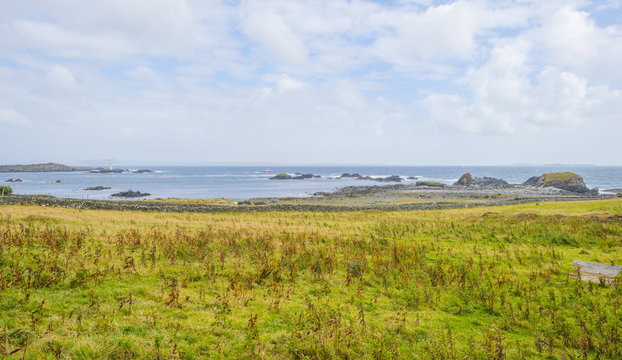 Panorama of the coast of an irish island in the atlantic ocean in summer