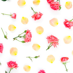 Floral pattern with roses flowers and petals on white background. Flat lay, top view.