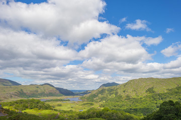 Naklejka premium Scenic panorama of green mountains and blue lakes in summer 