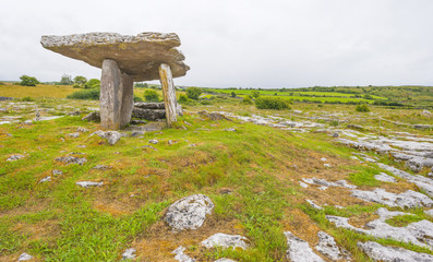 Ancient portal tomb in the karst landscape of national park the Burren 