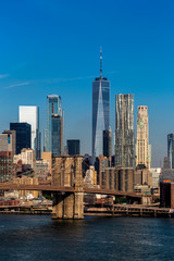 Naklejka premium Brooklyn, NY / USA - JUL 31 2018: Lower Manhattan Skyline in clear daylight in the early morning