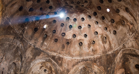 light rays through the Ottoman old hammam ceiling