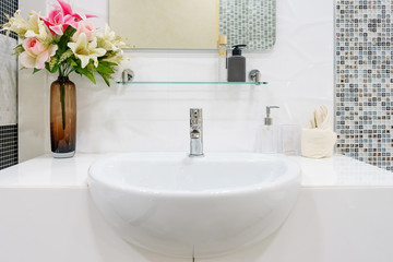 Interior of bathroom with sink basin faucet and mirror. Modern design of bathroom