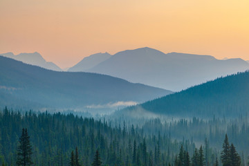 Naklejka na ściany i meble Break of Dawn With Mountain Silhouette in Banff National Park