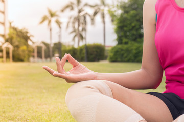 Young woman practicing doing yoga exercise,workout after waking up,Healthy and  lifestyle concept