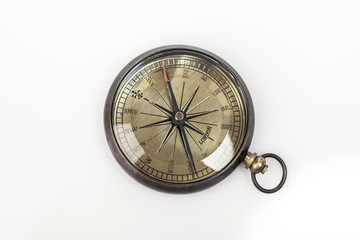 Fototapeta na wymiar vintage compass on the white