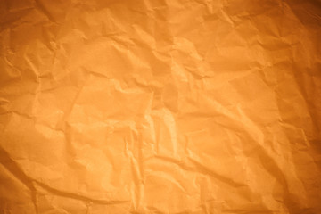 Brown crumpled paper background.