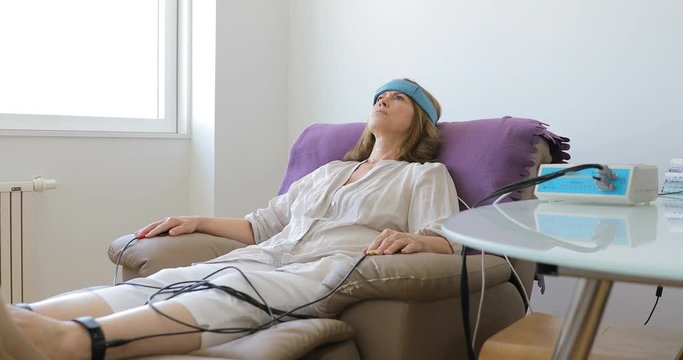 Biofeedback Patient Being Tested by Doctor