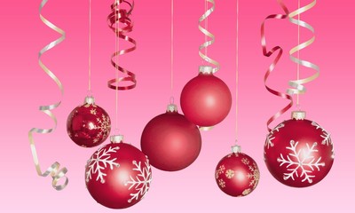 Red shiny decorative Christmas balls on white