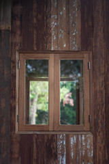 Wooden window frame on backyard