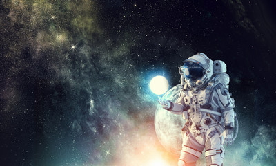 Fototapeta premium Spaceman and his mission. Mixed media