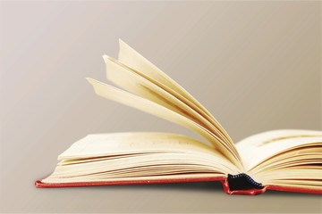 Colorful books collection on background.