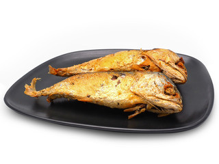 Fried Mackerel on dish.