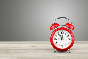 Retro alarm clock on   background
