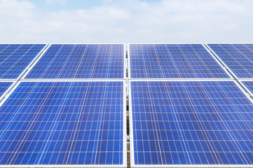 Close up rows array of polycrystalline silicon solar cells or photovoltaics in solar power plant...