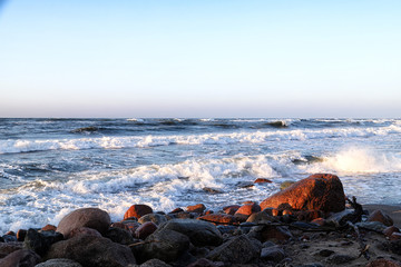 Obraz premium Sea landscape with rocky coastline during sunset. Baltic sea.