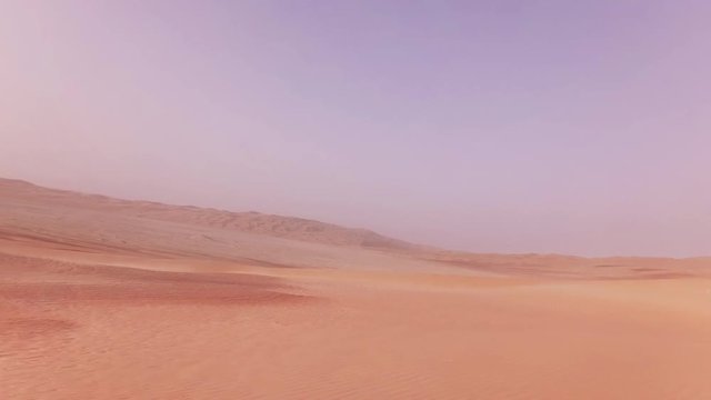 Traveling on an off-road car on the sand of Rub al Khali desert stock footage video