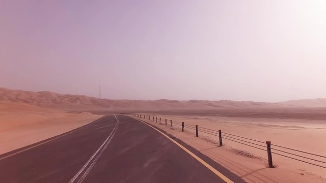 New road from Oasis Liwa to Moreeb Dune in Rub al Khali desert stock footage video