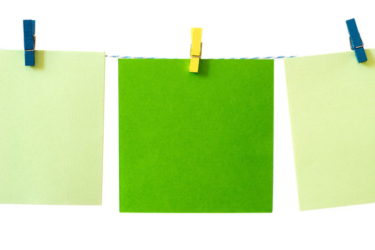 pieces of note paper pegged to a string macro