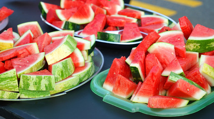  watermelon cut in pieces in the container for the event