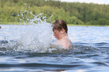 Boy play in water