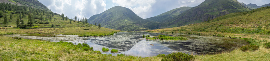 Obraz premium Landscape of the pond at Vivione mountain pass. Italian Alps