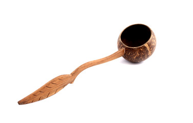 Coconut shell with white backdrop.