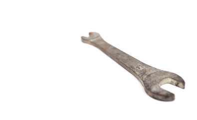 Wrench with white backdrop.