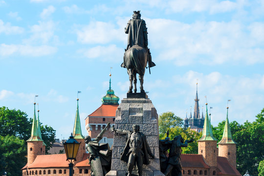 View of the Barbican and the monument to Grunwald in Krakow, Poland