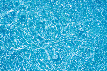 Water texture in the fountain. Blue abstract water texture_