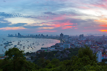 The building and skyscrapers in twilight time in Pattaya,Thailand. Pattaya city is famous about sea sport and night life entertainment.