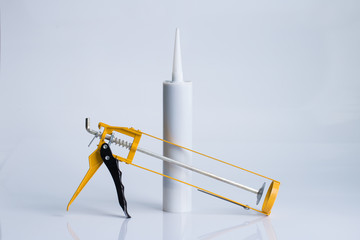 Glue gun for working with silicone adhesives and other construction fillers.